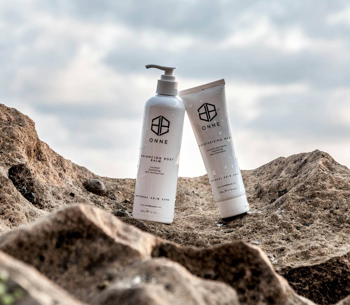 Skincare products on the rocks